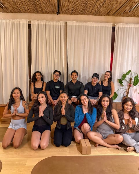 Joahnna with a group of ten students after a class